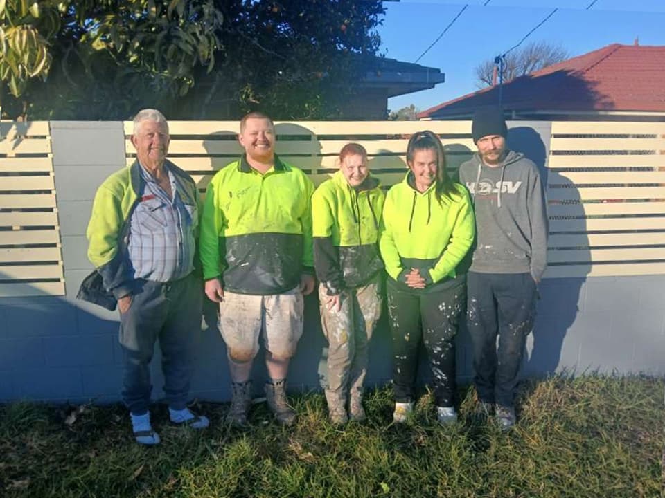 Painter measuring and prepping